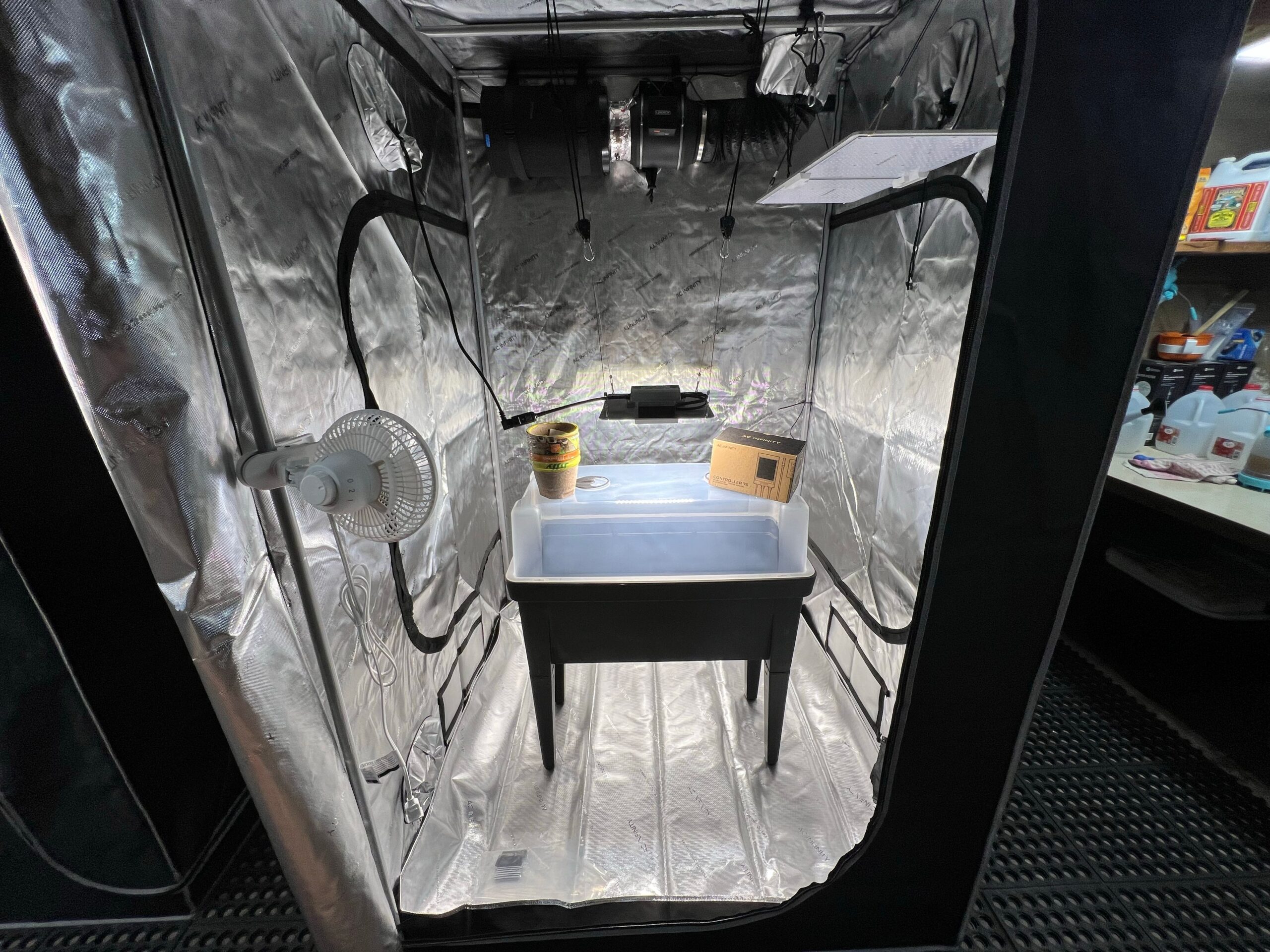 A closeup shot of a medical laboratory with foils on the walls and equipments for examining cannabis