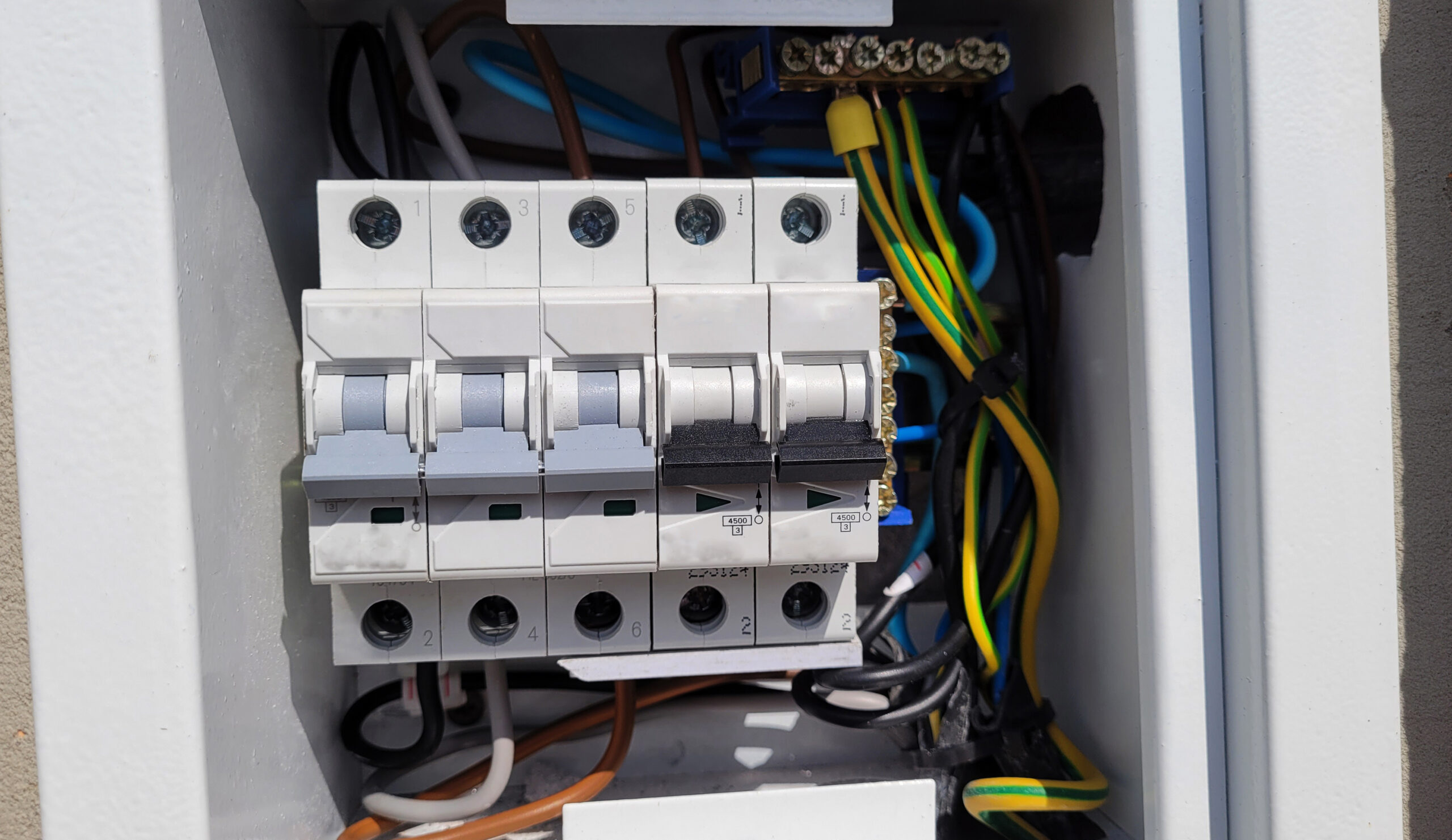 Electrical distribution panel used to illustrate circuit capacity and grow-light safety planning